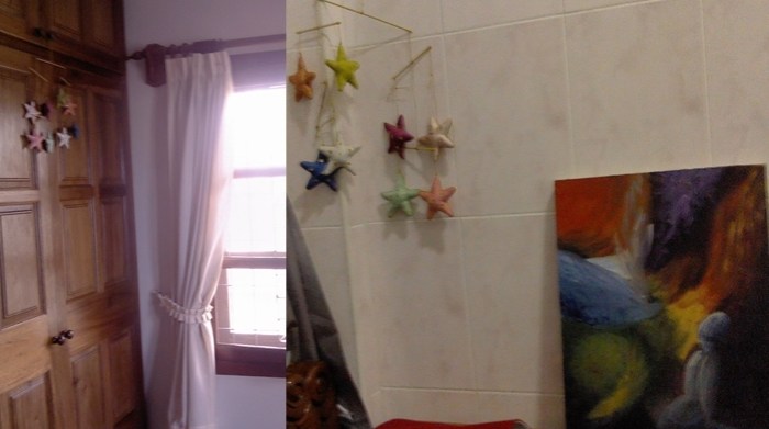 Stars hanging in by the window where I stayed my first few days, and next to a painting in my home here.